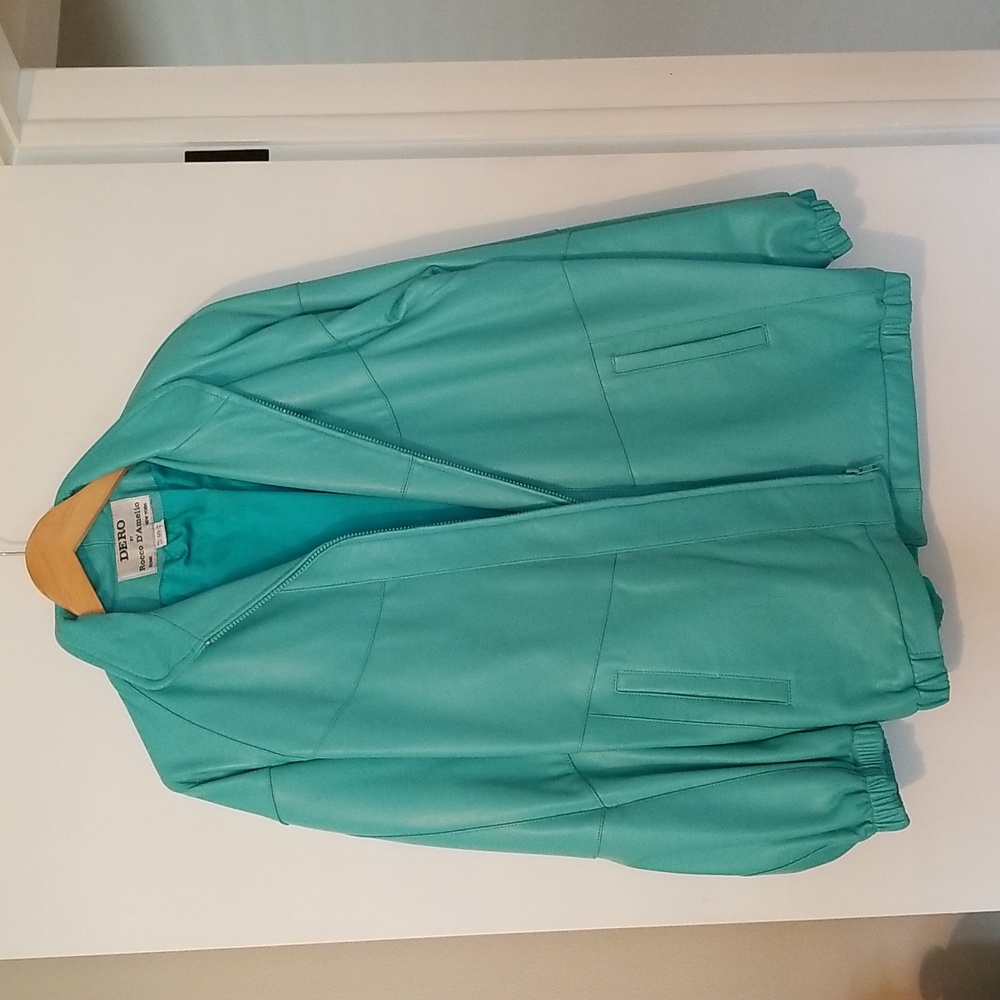 Dero leather jacket. Like new. Small.